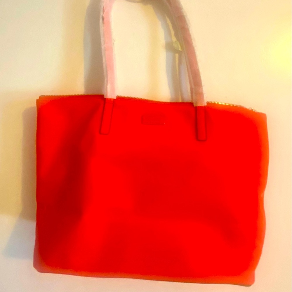 NWT Kate Spade nylon bag. Bright red with bright red straps. Perfect for summer!